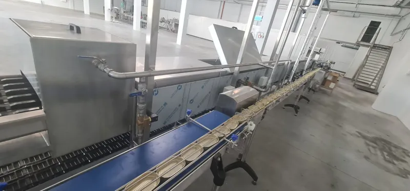 Zivju filejas blanšēšanas un konservu pakošanas līnija